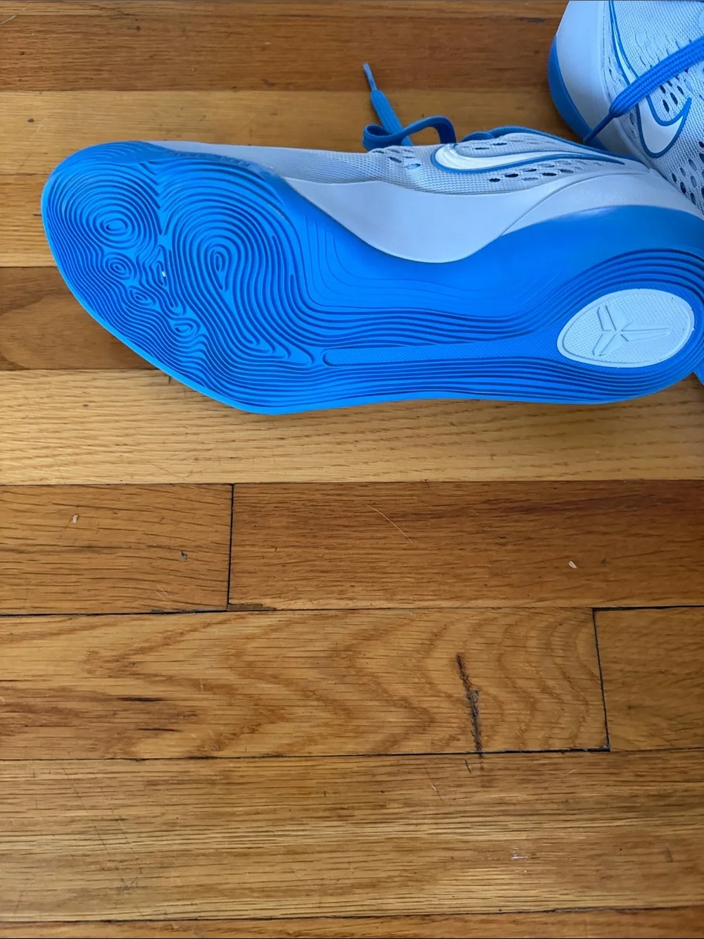 Kobe Nike Light Blue Sneakers with Bright Blue Accents